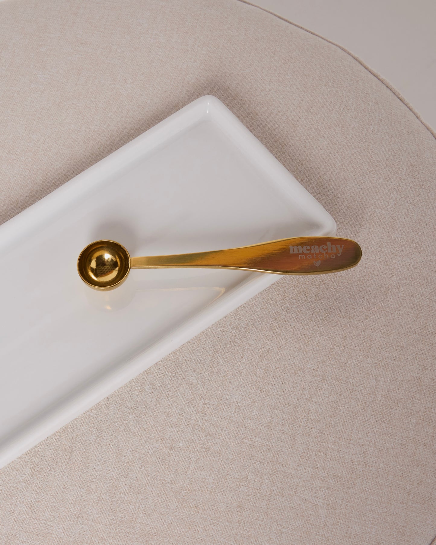 Goldener Messlöffel aus Edelstahl